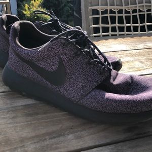 Black and grey speckled Nike Roche